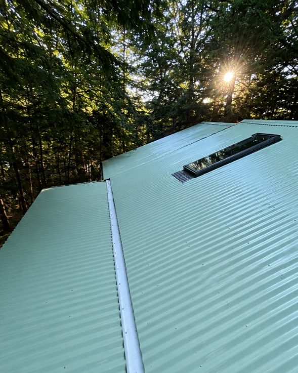 The same metal roof after cleaning, bright and even