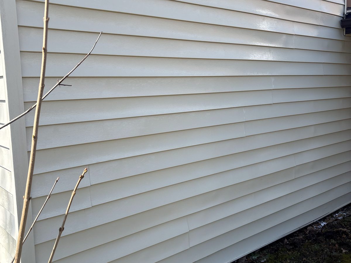 Clean white vinyl siding after a house wash